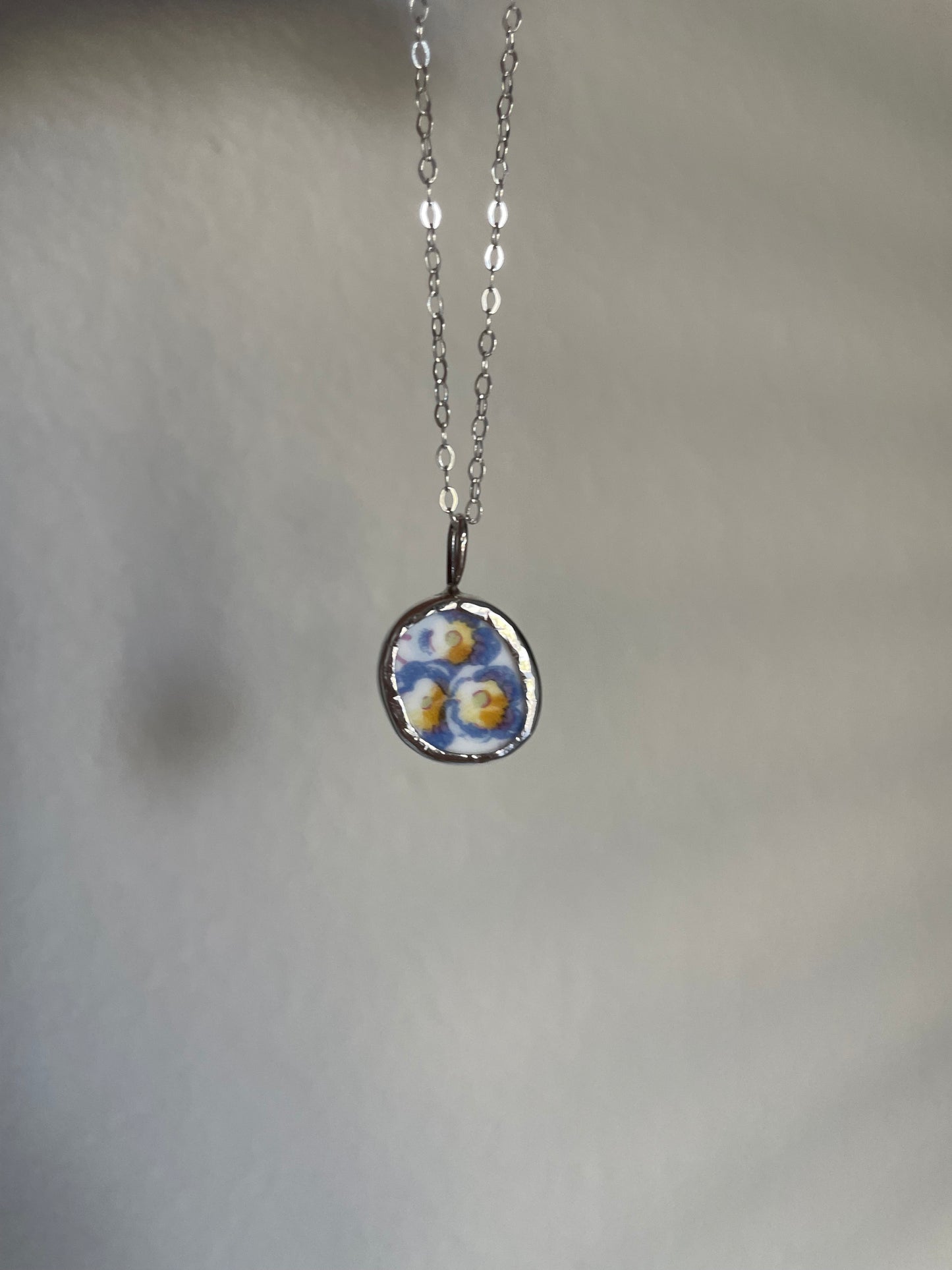 Floral pottery pendant (no chain)