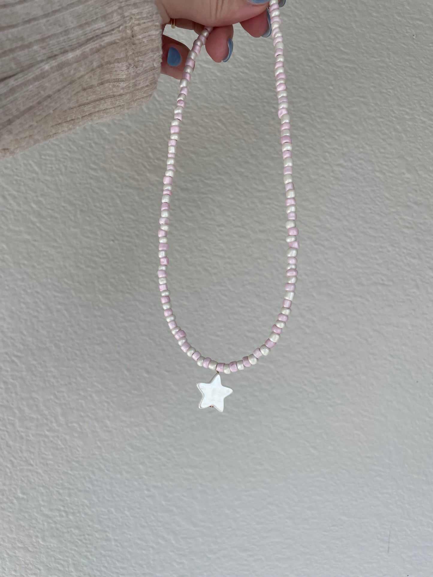 Pink and cream shell star necklace