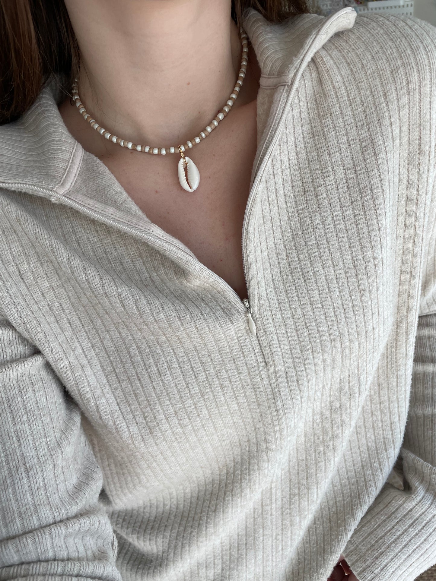 Brown and cream cowrie pendant