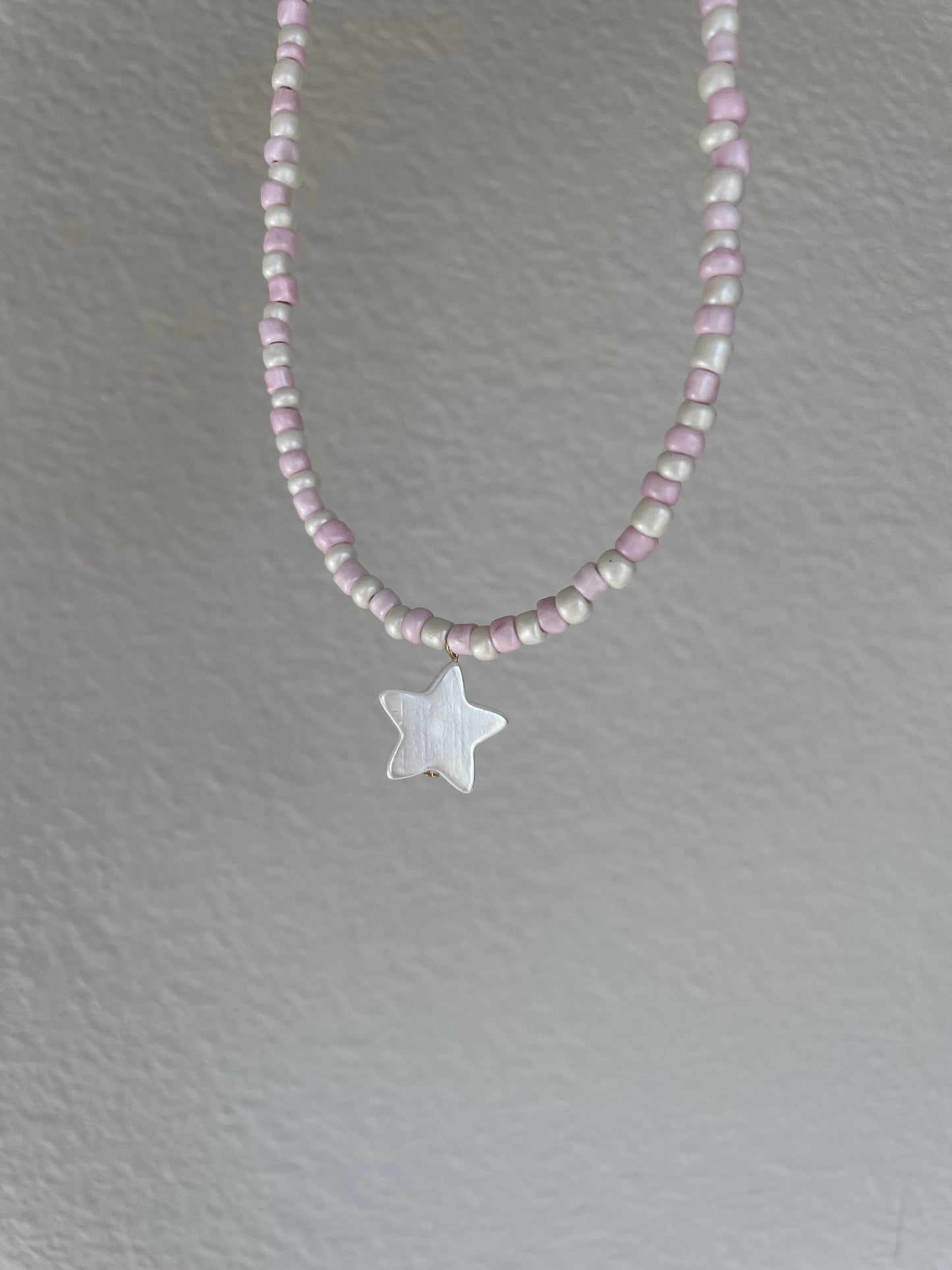 Pink and cream shell star necklace