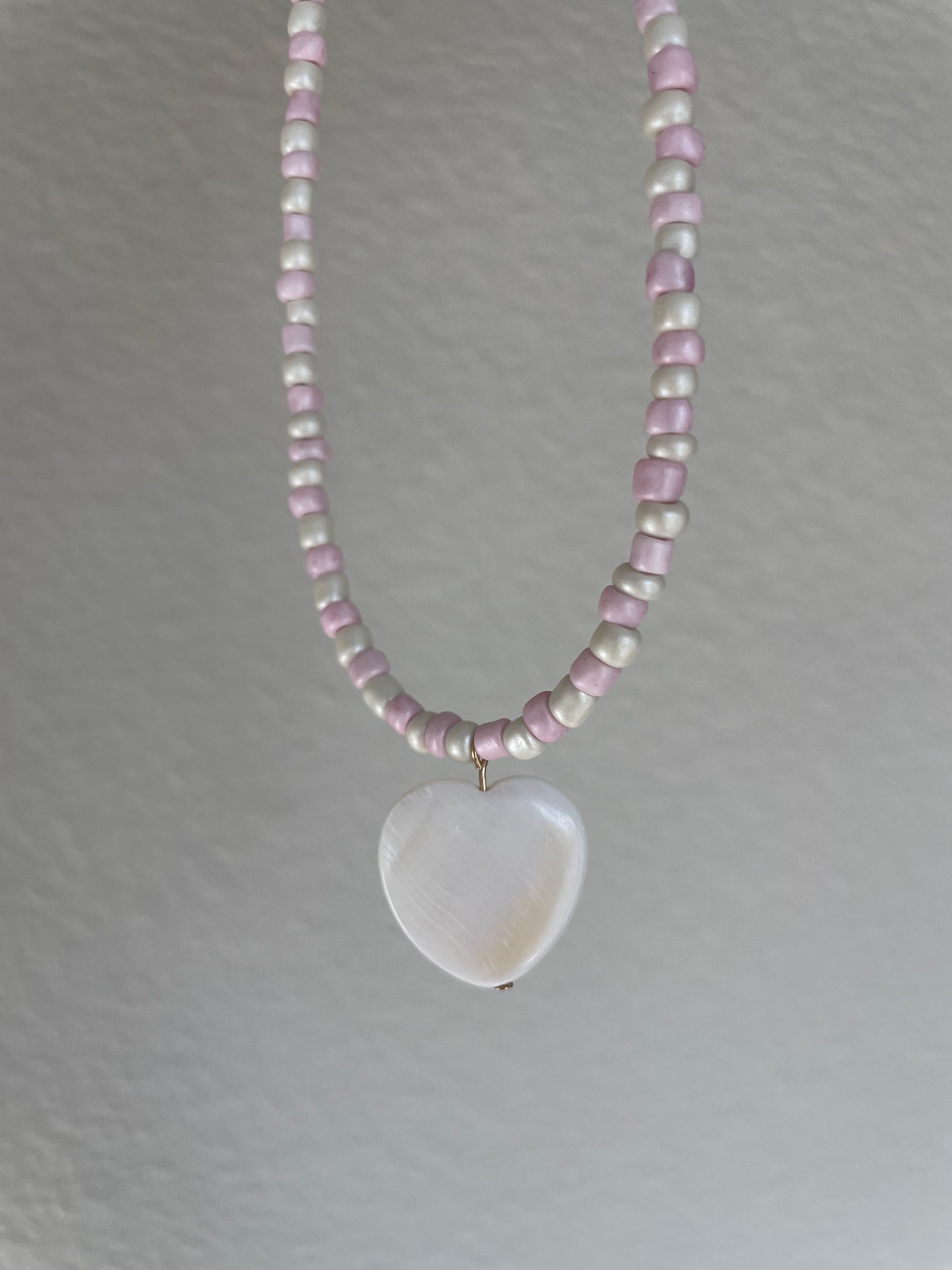 Pink and cream shell heart pendant